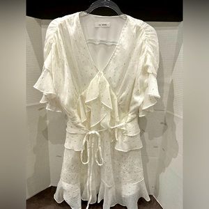 White ruffle mini dress with silver and gold details